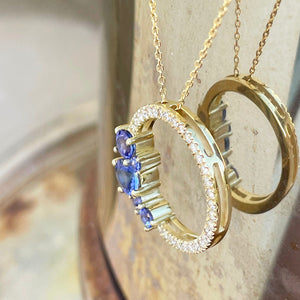 Tanzanite and diamond halo pendant