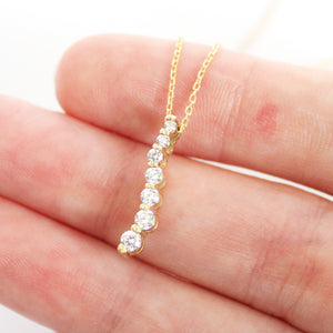 Subtle S Curve Double Claw Petite Diamond Pendant