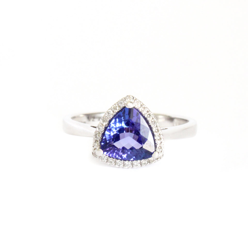 Tantalizing Trilliant Cut Tanzanite With Diamond Halo Ring