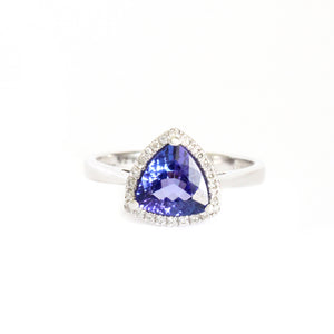 Tantalizing Trilliant Cut Tanzanite With Diamond Halo Ring