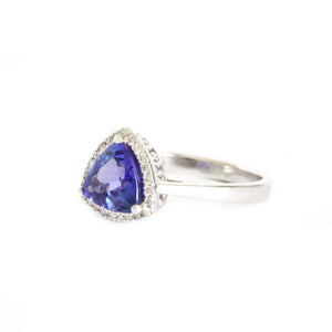 Tantalizing Trilliant Cut Tanzanite With Diamond Halo Ring