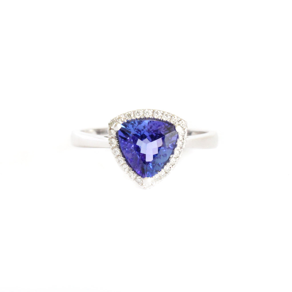 Tantalizing Trilliant Cut Tanzanite With Diamond Halo Ring