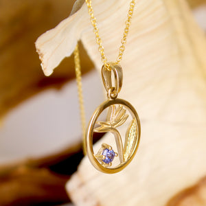 Tanzanite Circular Bird of Paradise Yellow Gold Pendant