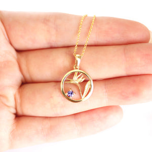 Tanzanite Circular Bird of Paradise Yellow Gold Pendant