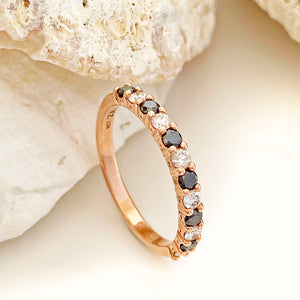 Black and white diamond rose gold eternity ring