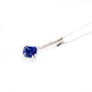 Ultra Glam Cushion Cut Tanzanite and Elaborate Side Sweep White Diamond Bale Pendant