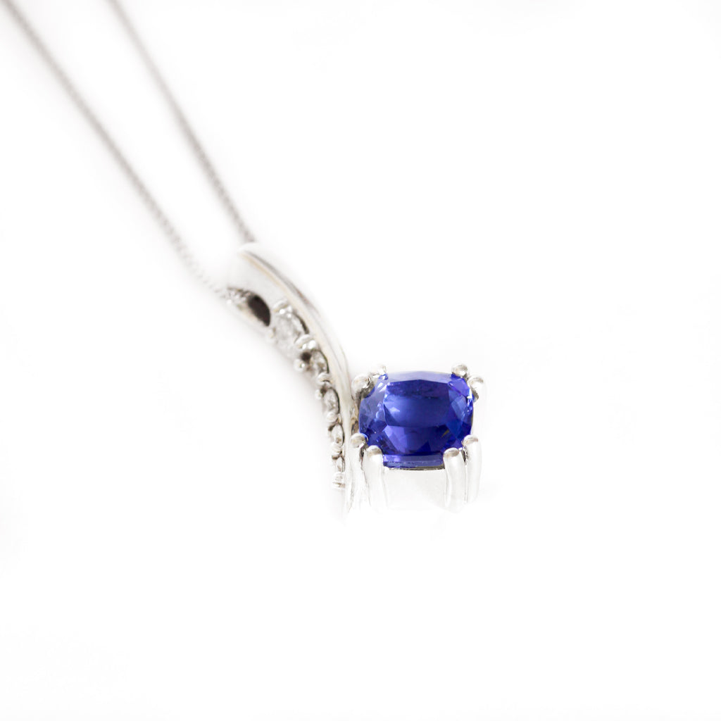 Ultra Glam Cushion Cut Tanzanite and Elaborate Side Sweep White Diamond Bale Pendant