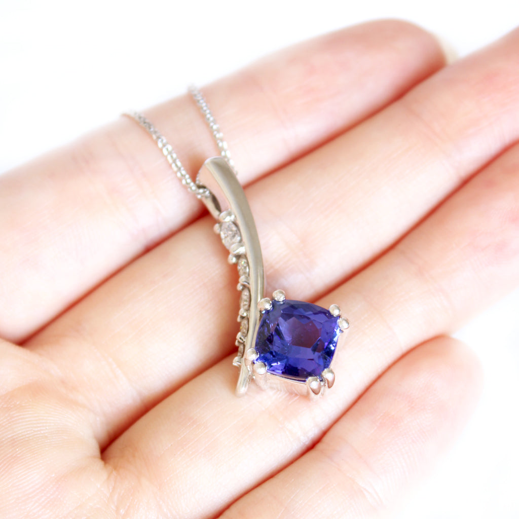 Ultra Glam Cushion Cut Tanzanite and Elaborate Side Sweep White Diamond Bale Pendant