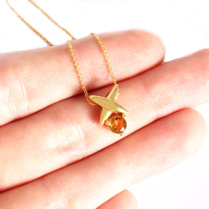 Yellow Gold Four Pointed Star Pendant with Round Cut Citrine