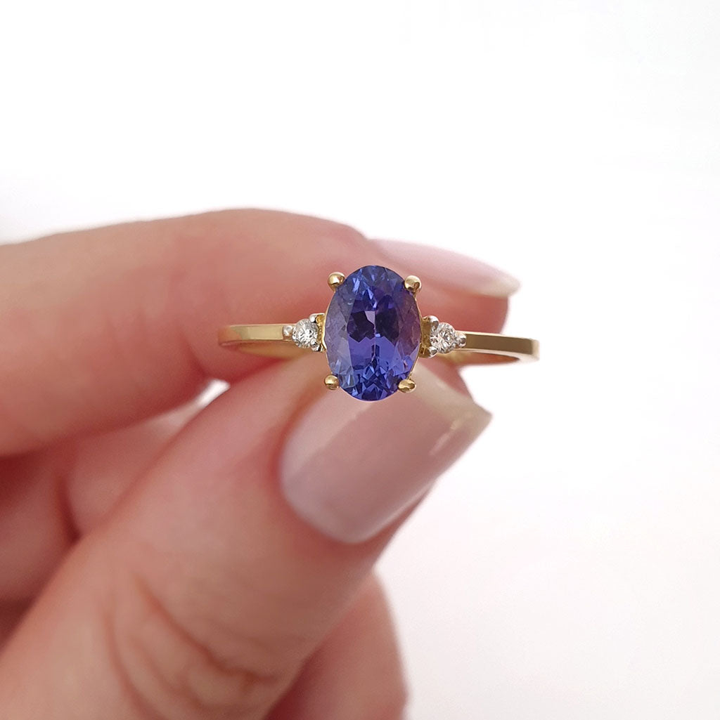 Elegant Oval Tanzanite and Petite Diamond Accent Yellow Gold Ring