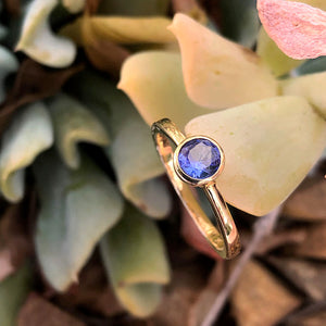 Elegant Round Cut Bezel Set Solitaire Tanzanite Ring