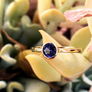 Elegant Round Cut Bezel Set Solitaire Tanzanite Ring