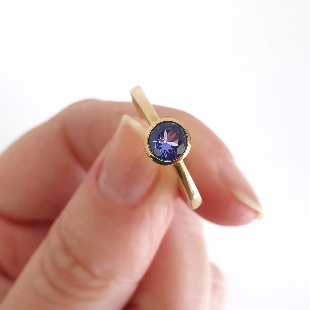 Elegant Round Cut Bezel Set Solitaire Tanzanite Ring