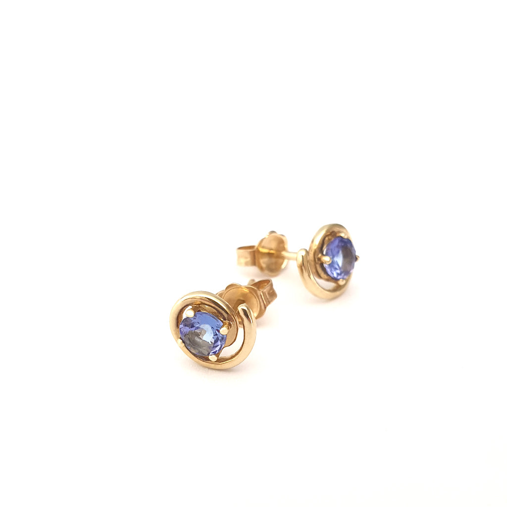 Flirty Yellow Gold Swirl Tanzanite Studs