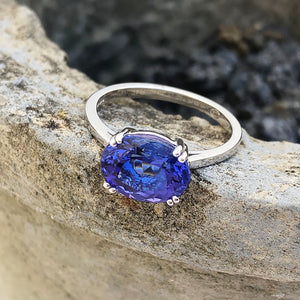 Oval Cut Double Claw with Ornate Basket Tanzanite Ring