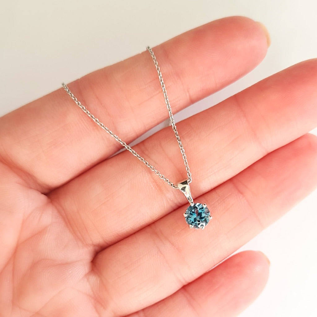 Elegant Round Cut Blue Topaz Pendant and Chain