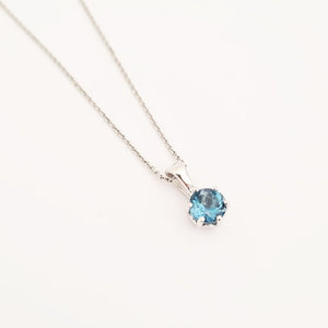 Elegant Round Cut Blue Topaz Pendant and Chain