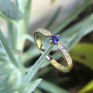 Petit Tapered Diamond Shoulder Tanzanite Yellow Gold Ring