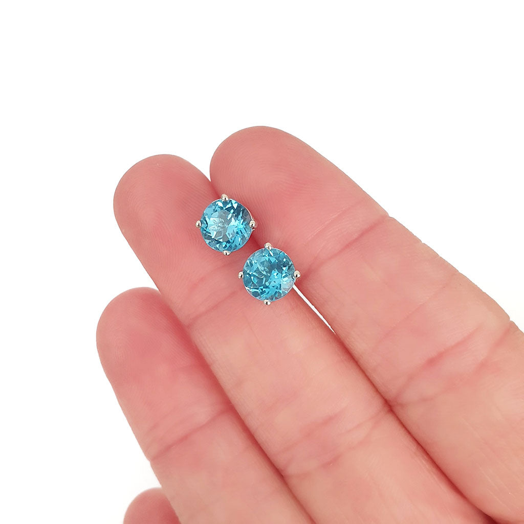 Silver 4 Claw Blue Topaz Studs 7mm x 7mm