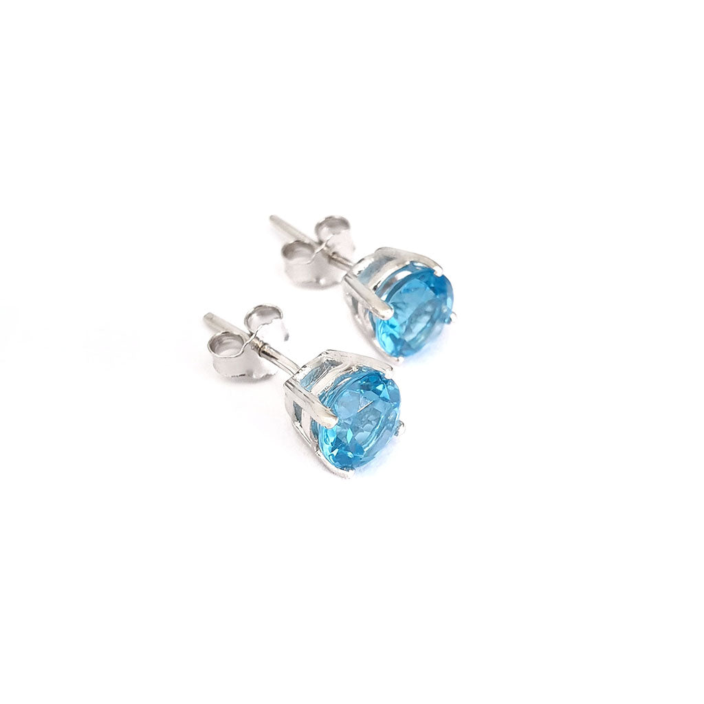 Silver 4 Claw Blue Topaz Studs 7mm x 7mm