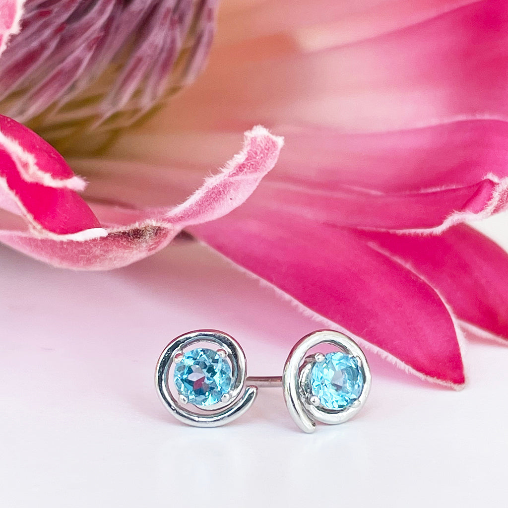 Silver Blue Topaz Spiral Studs