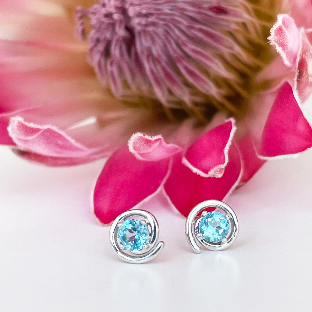 Silver Blue Topaz Spiral Studs