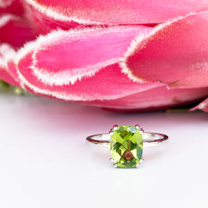 Silver Double Claw Peridot Cushion Cut Ring