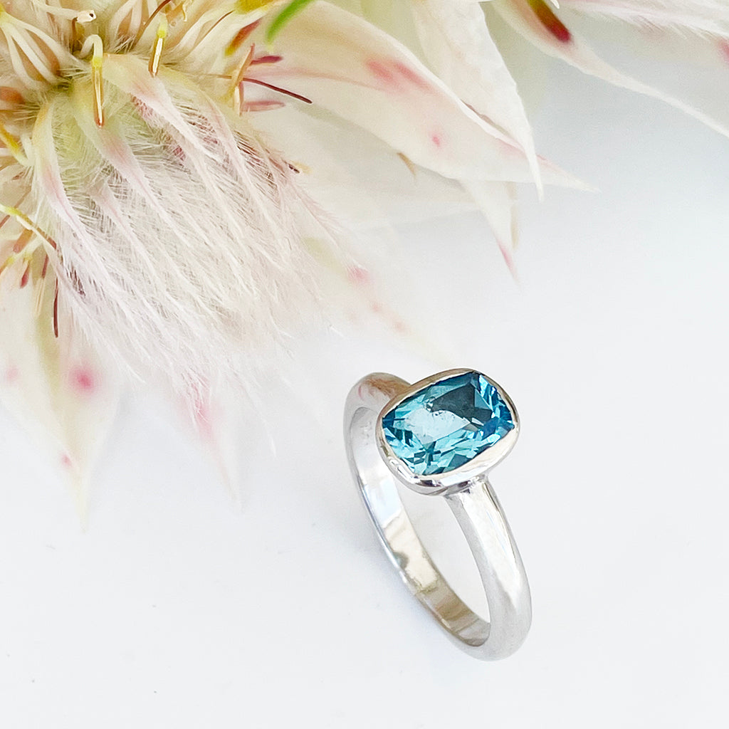 Silver Elongated Cushion Bezel Set Blue Topaz Ring