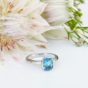 Silver Elongated Cushion Bezel Set Blue Topaz Ring