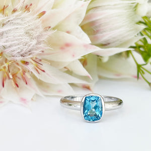 Silver Elongated Cushion Bezel Set Blue Topaz Ring