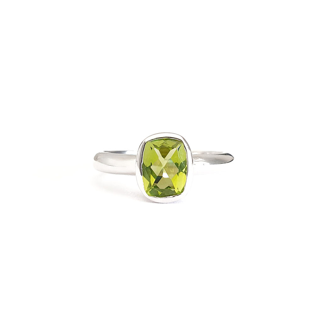 Silver Elongated Cushion Bezel Set Peridot Ring