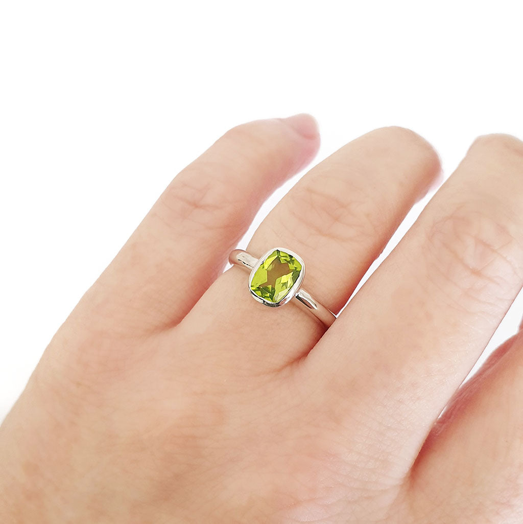 Silver Elongated Cushion Bezel Set Peridot Ring