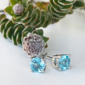 Silver 4 Claw Blue Topaz Studs 7mm x 7mm