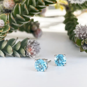 Silver 4 Claw Blue Topaz Studs 7mm x 7mm