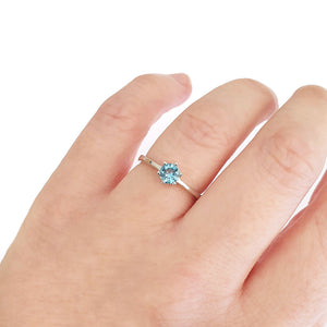 Silver Solitaire Six Claw Blue Topaz Ring