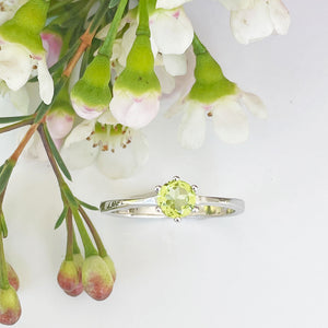 Silver Solitaire Six Claw Peridot Ring