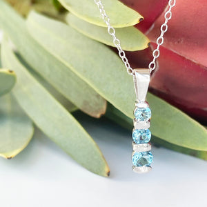 Silver Three Bar Pendant set with Blue Topaz