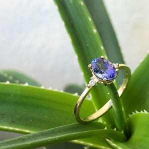 Elegant Oval Tanzanite and Petite Diamond Accent Yellow Gold Ring