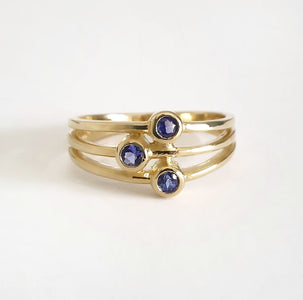 Triple Tanzanite Split Shank Yellow Gold